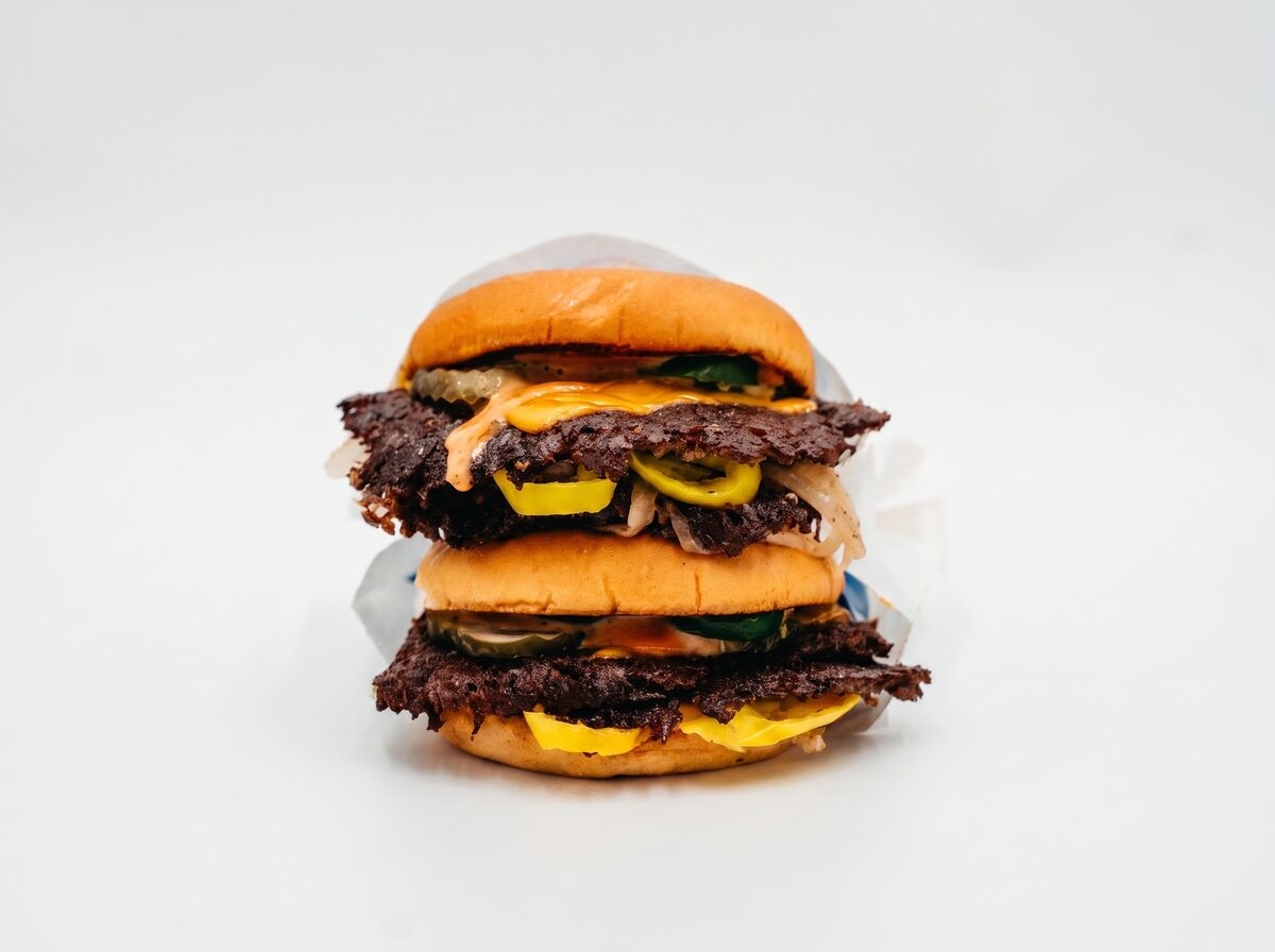 Double Hyphy Burger stacked with pickles and sauce