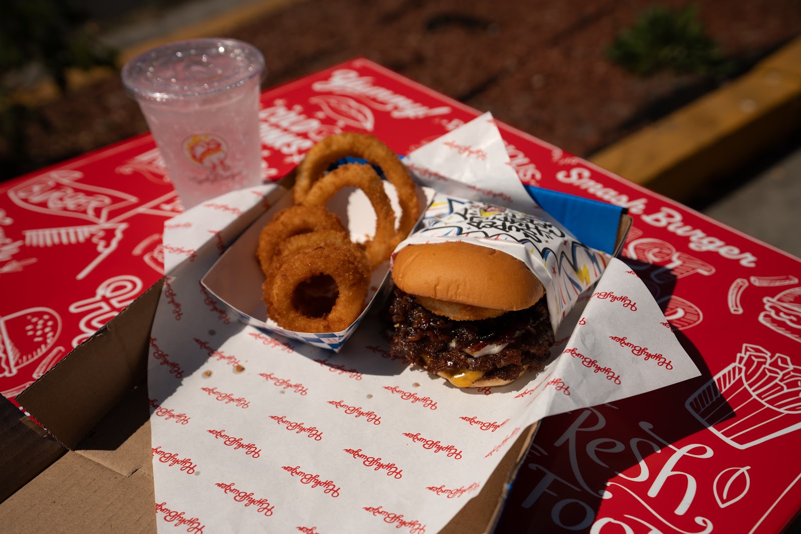 880 Jam Meal — Keak Da Sneak Super Hyphy Burger, onion rings and a drink